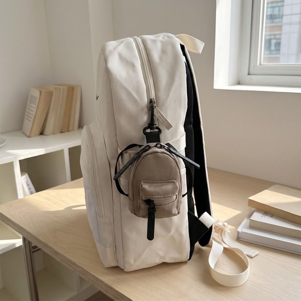 محفظة نقود صغيرة ملونة على شكل - مراجعة Mini Backpack Purse وسعره