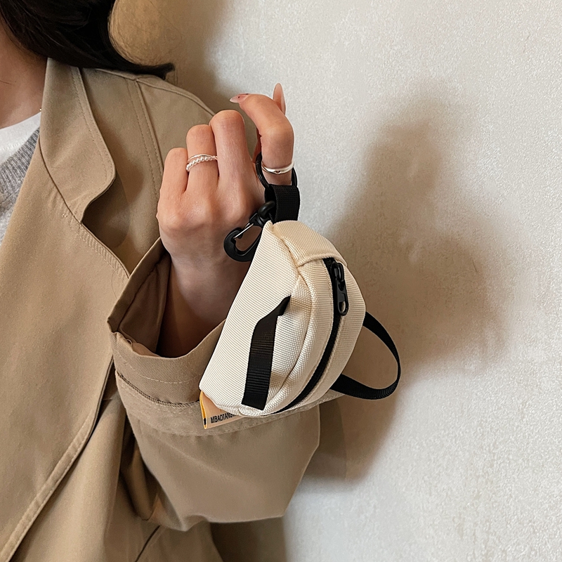حقائب صغيرة لطيفة لسماعات الأذ - مراجعة Canvas Backpack Casual وسعره